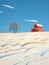 Prairie Farmhouse Buried In Snow, A House In A Snowy Field