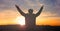 Praise and worship concept: Silhouette human raising hands to praying God on blurred cross with crown of throne sunset background