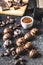 Praline bonbons. Chocolate truffles and cocoa powder
