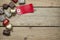 Pralines and red sign on wooden background