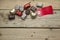 Pralines and red sign on wooden background