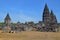 Prambanan Temples with stone ruins seen from outside the complex