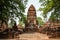 Prang and statue of Buddha, Wat Mahathat temple, Ayutthaya, Chao Phraya Basin, Central Thailand, Thailand