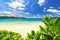 Praslin island Tropical beach with green foliage and nice sea si