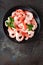 Prawns on plate. Shrimps, prawns. Seafood. Top view. Dark background