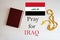 Pray for Iraq. Rosary and Holy Bible background