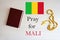 Pray for Mali. Rosary and Holy Bible background