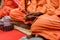 Pray of monks on ceremony of buddhist in Thailand. Many Buddha monk sit on the red carpet prepare to pray and doing buddhist cere