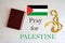 Pray for Palestine. Rosary and Holy Bible background
