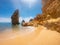 Praya de Marinha most beautiful beach in Algarve, Portugal. Cliffs on Coast of Atlantic ocean against blue sky
