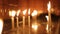 Prayer candles burning in water in church