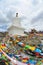 Prayer flags with white tower
