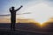 Prayer. Man on his knees praying. Against the background of the sky and sunset. Forgiveness of sins and repentance.