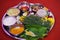 Prayer or puja plate with auspicious essentials for ceremony