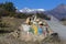 Prayer stones in Tibetan Buddhism, on the hill in Himalaya mountains. Annapurna region, Nepal