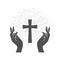 Prayer symbol, shining Crucifix and hands of believer, holy cross worship