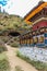 Prayer wheels near Tamchog Lhakhang Monastery, Paro River, Bhutan.