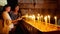 Prayers lighting candles in Holy Sepulcher Church
