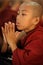 Praying Buddhist novice