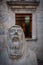 Praying man in Hvar Town (Grad Hvar) at Benedictine Convent Square