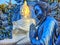 Praying monk statue at Wat Rong Suea Ten Blue temple, Chiang Rai, Thailand