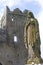 Praying Virgin Mary Statue with castle behind, Rock of Cashel