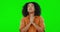 Praying, woman and green screen with hope, anxiety and stress with prayer hands and wish. Help, asking and support of a