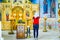 A praying woman in an Orthodox Christian church in the village of Holy Hand, Krasnodar Territory.