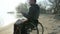 Prays disabled person, sick person holds bible in hands, faith Hope, an invalid in wheelchair with holy book