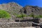 Pre-Columbian ruins in a barren landscape