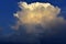 Pre-storm Cumulus blue clouds in the evening sky