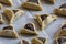 Prebaked `Haman pockets`, also known as Hamantashen, an Ashkenazi Jewish triangular filled-pocket cookies, usually associated with