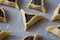 Prebaked `Haman pockets`, also known as Hamantashen, an Ashkenazi Jewish triangular filled-pocket cookies, usually associated with