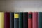 Precious books in a white shelf