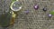 precious gemstones and a magnifying loupe on sack cloth