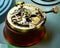 Precious pocket watch disassembled on the watchmaker`s work table