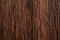 Precious wood texture. Of rustic aspect and dark, ocher, brown, toasted, black tones.