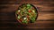 Precisionist Style Salad Bowl On Wooden Background