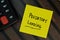 Predatory Lending write on sticky notes isolated on Wooden Table. Business or Finance concept