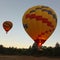 A Predawn Double Hot Air Balloon Liftoff