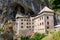 Predjama Castle in Slovenia, Europe. Renaissance castle built within a cave mouth in south central Slovenia.
