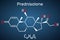 Prednisolone molecule. Is known as a corticosteroid or steroid medication. Structural chemical formula on the dark blue background