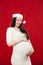 Pregnancy Christmas on a red background