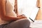 Pregnancy digital screen mockup. Pregnant woman holding blank laptop screen. Mobile pregnancy online maternity