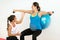 Pregnancy exercise with pilates ball and dumbbell