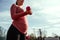 Pregnancy exercise. Pregnant woman training yoga sport exercise. Prenatal healthy fitness active fit gym outside