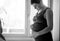 Pregnancy, love, people and expectation concept - happy pregnant