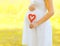 Pregnancy, maternity and new family concept - pregnant woman