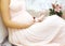 Pregnancy, motherhood and happy future mother concept - woman