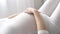 Pregnancy. Pregnant Woman Touching Baby Belly Closeup